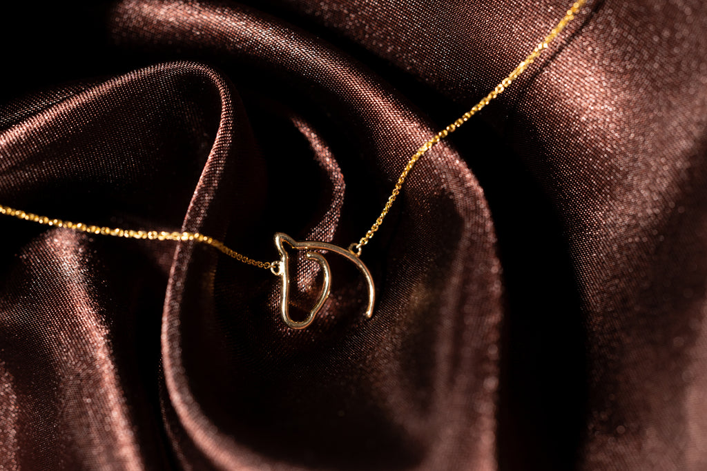 the gilded horse - anchored pendant necklace