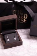 Sterling silver earrings with The Gilded Horse logo, in a nice jewelry box with packaging.