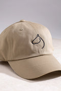The Gilded Horse khaki dad hat with an embroidered horse-head logo, side angle