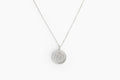 White gold diamond-border medallion with engraved horse-head, on slim chain