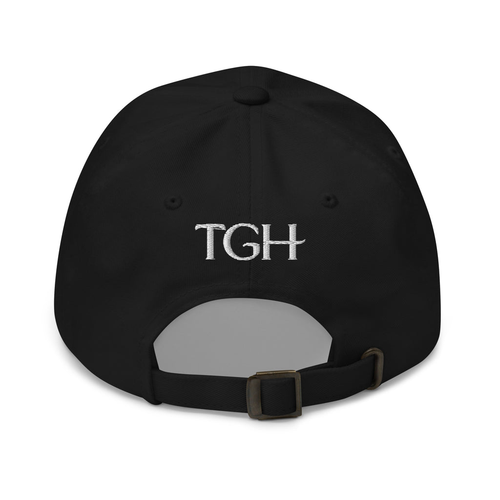 Back of a black The Gilded Horse dad hat with white embroidered TGH lettering