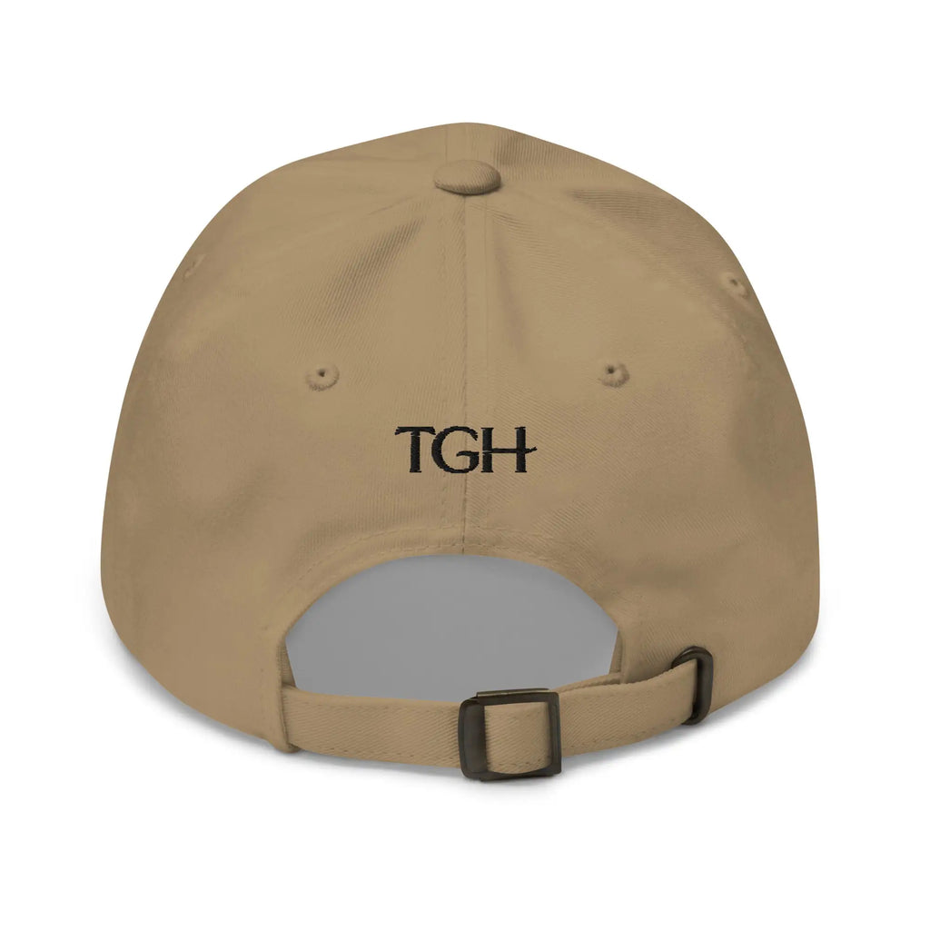 Back of khaki dad hat with black embroidered TGH lettering and adjustable strap