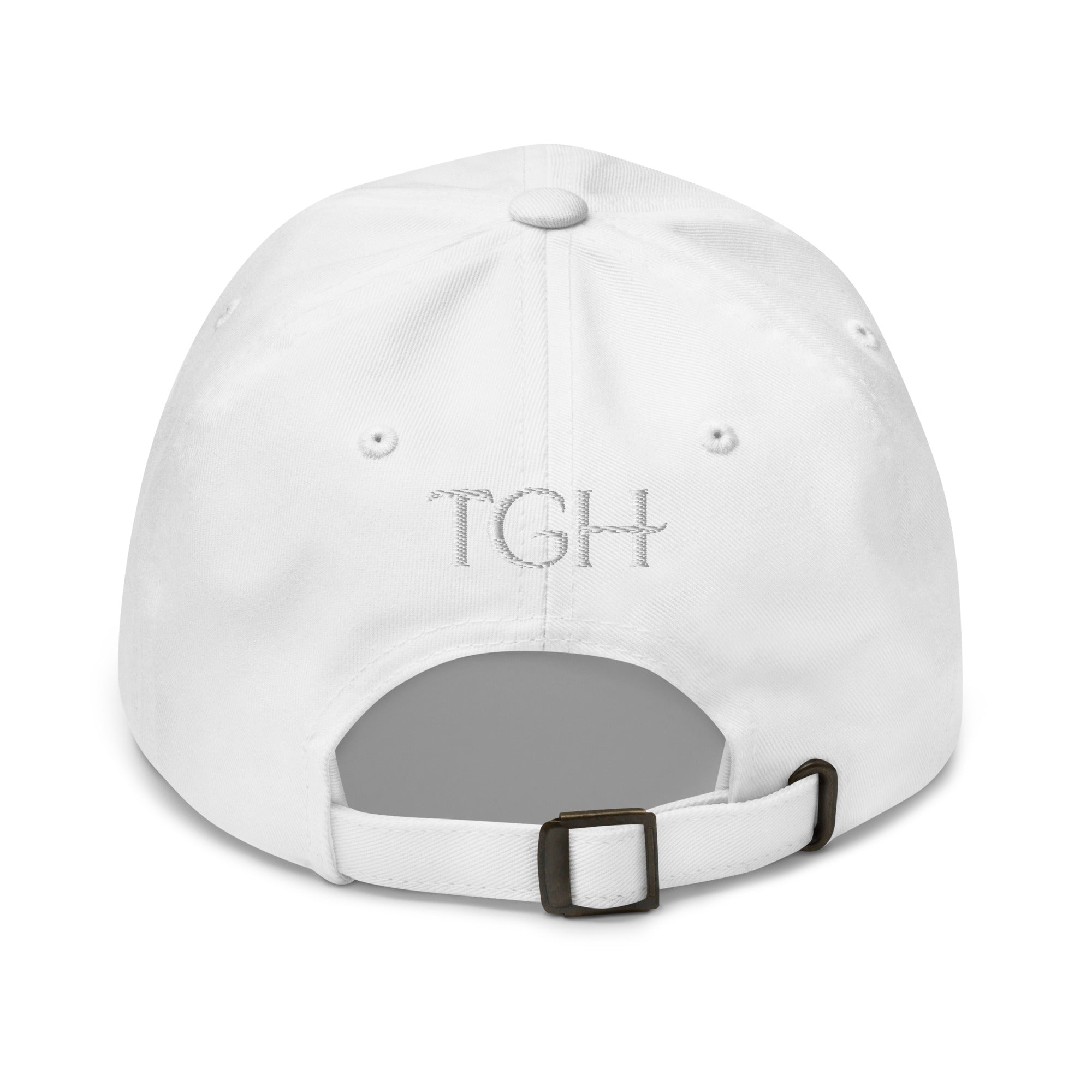 Back of a white dad hat with tonal white "TGH" embroidery and buckle strap