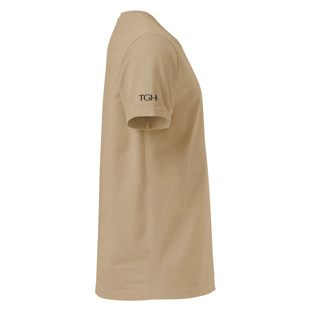 Sand-colored oversized t-shirt, right side view with black TGH sleeve embroidery